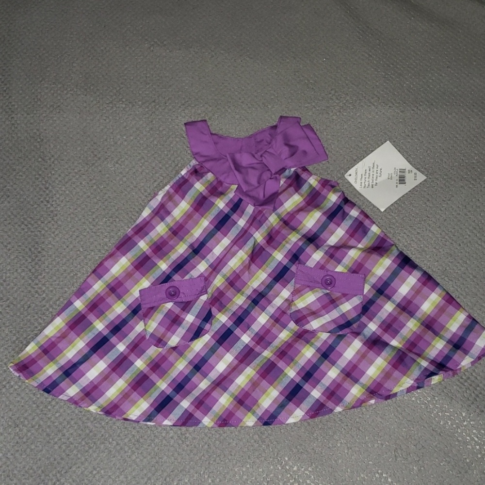 Purple plaid dress with big bow.